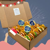 GRUB Singapore assorted burger sliders party box with 24 mini burgers, featuring cheeseburger, maple bacon, salted egg chicken, and har cheong gai chicken.
