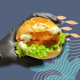 GRUB Singapore Crispy Fish Slider with lettuce, tomato, and tartar mayo on a mini brioche bun.