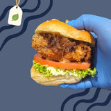 GRUB Singapore mini crispy fish burger slider with lettuce, tomato, and caramelized onions