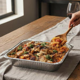 GRUB Singapore Grilled Chicken Tomato Fusilli pasta party tray, serves 8-12, in aluminum foil container.