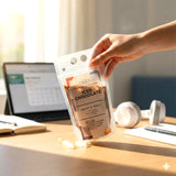 GRUB Singapore Iced Chocolate drink pouch held by hand, ready-to-drink beverage for a quick pick-me-up.