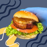 GRUB Singapore Maple Bacon Slider with thick-cut pork bacon, pineapple, lettuce, tomato, and brioche bun.