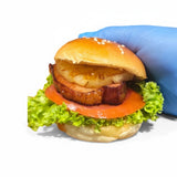 GRUB Singapore Maple Bacon Slider with thick-cut pork bacon, pineapple, lettuce, tomato, and brioche bun.