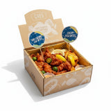 GRUB Singapore Mixed Bites Box with crispy fish and chicken bites, garnished with lemon slices and calamansi.