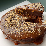 GRUB Singapore Salted Caramel Chocolate Tart with dark chocolate ganache, salted caramel, and hazelnut praline feuilletine topping.
