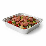 GRUB Singapore Asian Smoked Duck Salad tray with pineapple, corn, and cherry tomatoes in a disposable foil container.