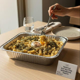 GRUB Singapore Truffle Soy Butter Mushroom Pasta tray with fusilli, topped with seaweed and a soft-boiled egg.